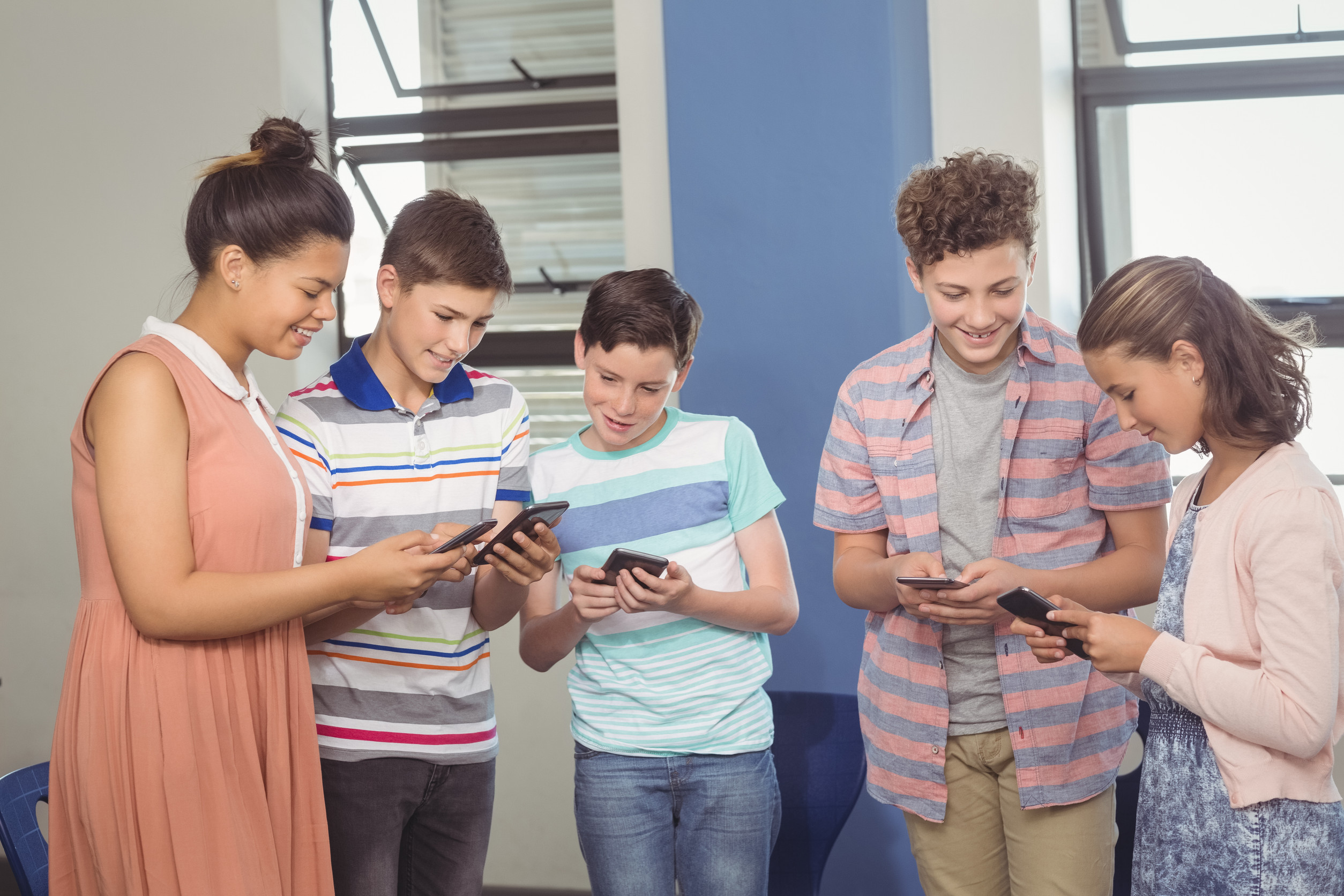 Students using educational app on tablets